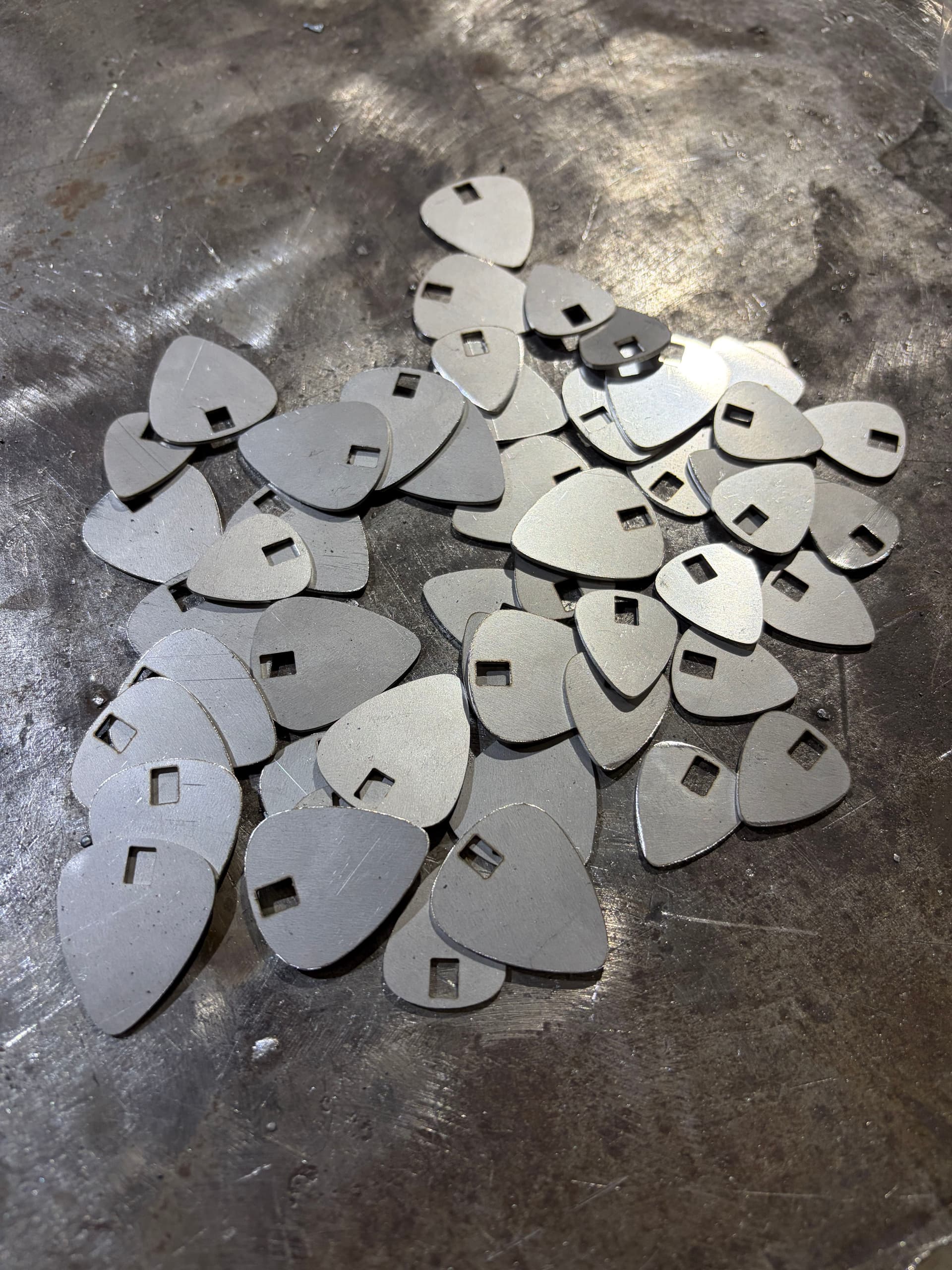 Custom Guitar Pick Metal Pieces for a Nashville Bag Line image