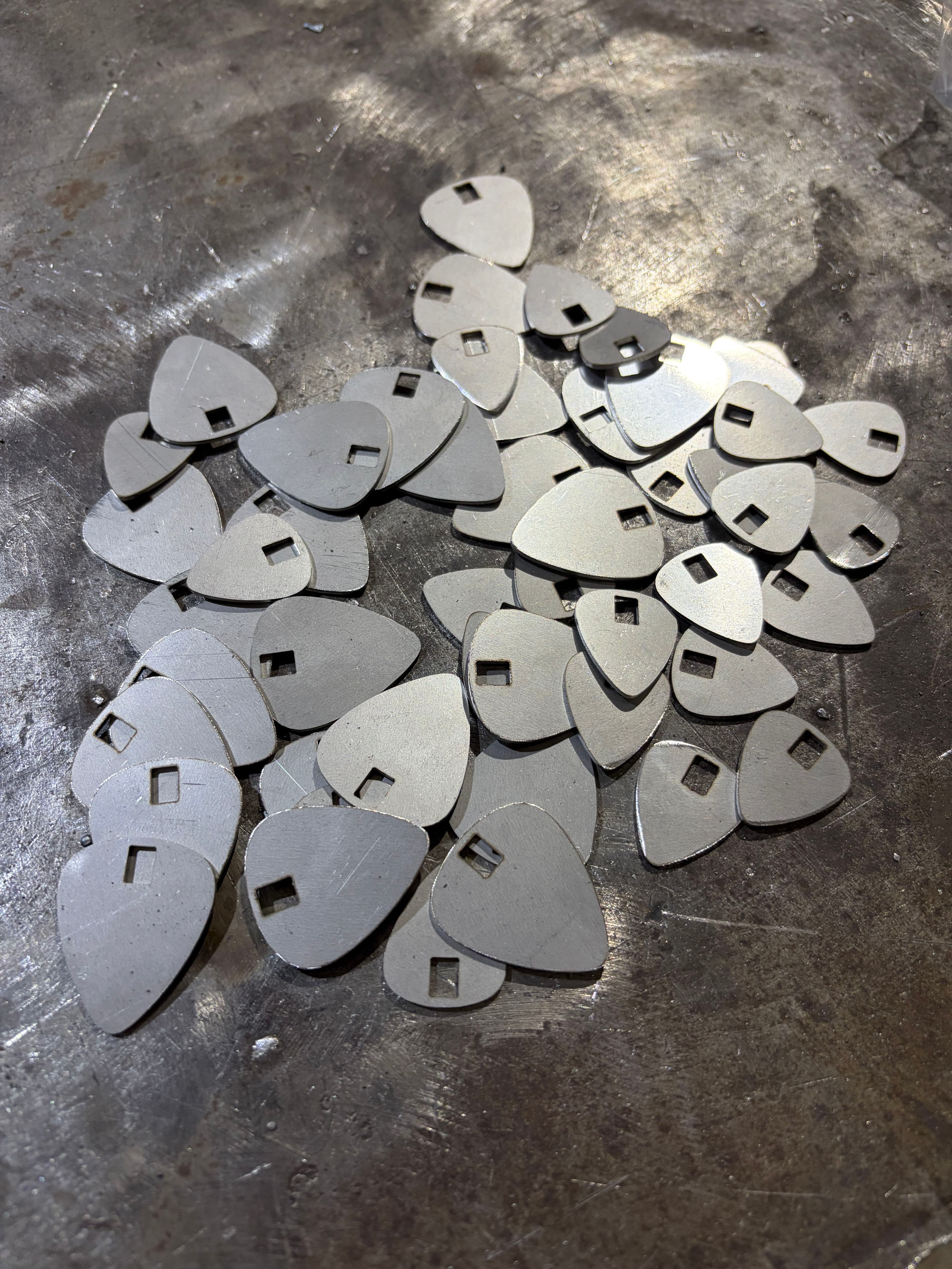 Project Custom Guitar Pick Metal Pieces for a Nashville Bag Line image